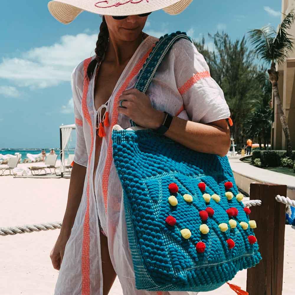 woman carrying unique beach tote