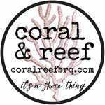 coral and reef boutique logo. Black wording with faded reef in background